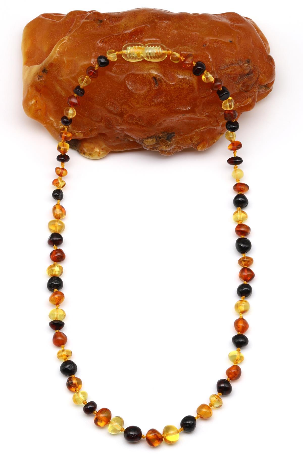 Collier bébé en ambre naturel – vue de face – 32 cm